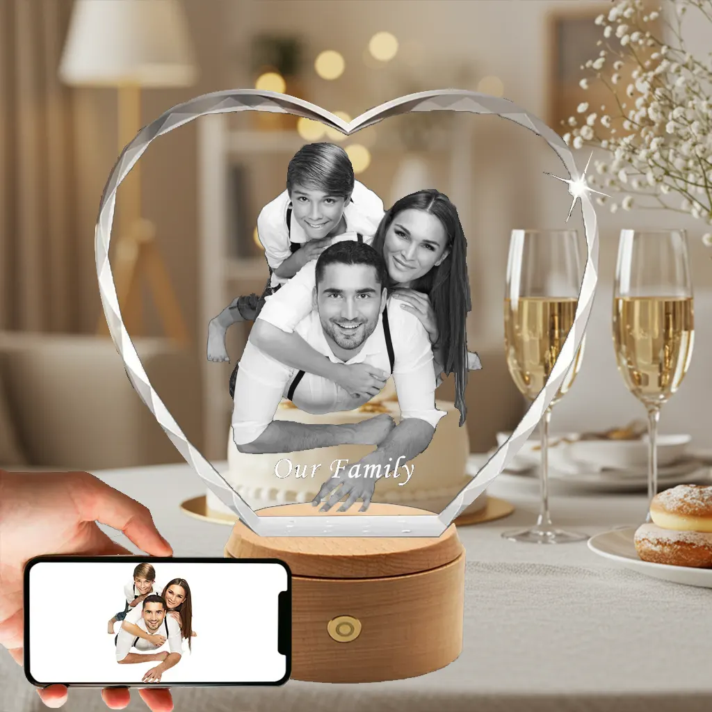 A diamond-cut heart-shaped 3D crystal, engraved with a joyous family portrait, as a commemorative gift for a child's Baptism or Christening.