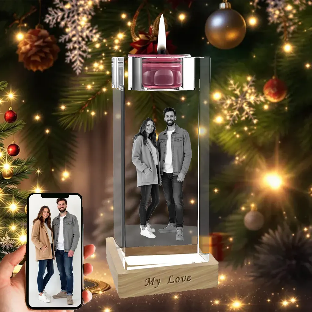 A personalized crystal candlestick holder with a 3D engraved photo of a couple, its wooden base engraved with "My Love," presented as a romantic Christmas gift in front of a festive tree.