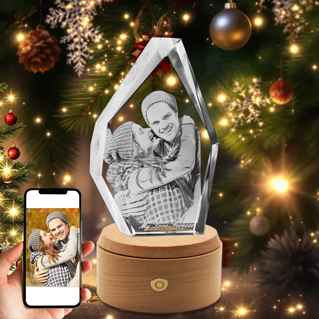 An iceberg-shaped 3D photo crystal engraved with a cozy couple's portrait and "My Love Forever", presented as a warm Christmas gift in front of a festive tree.