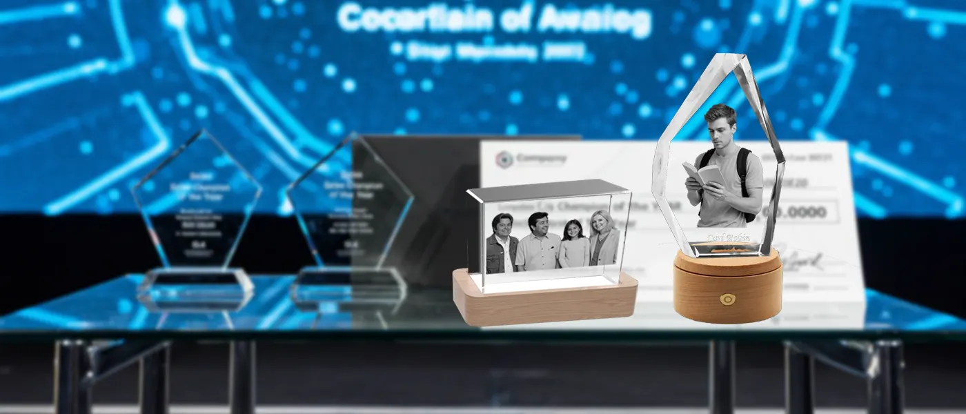 A display of custom 3D photo crystal awards, positioned alongside traditional corporate trophies on a stage, with a large digital screen in the background for an awards ceremony