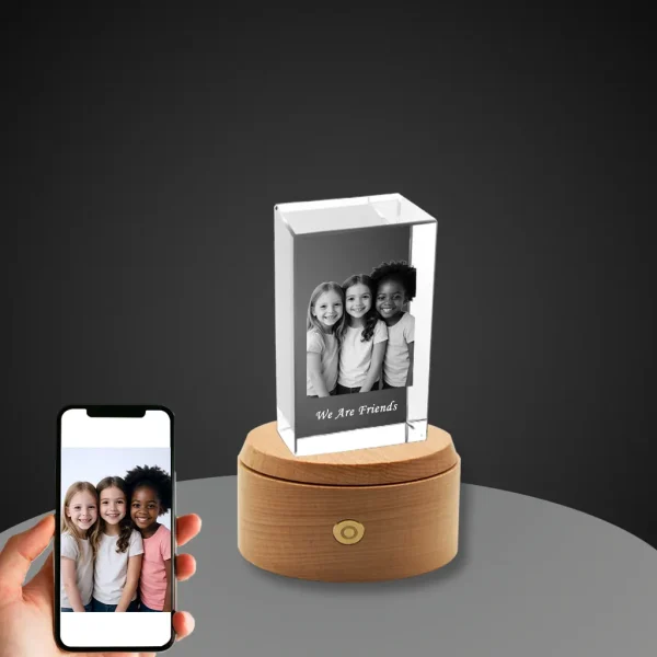 YiYues Personalized 3D Rectangular Crystal Block featuring a custom photo of three young friends, with the engraving 'We Are Friends' on a classic wooden LED base